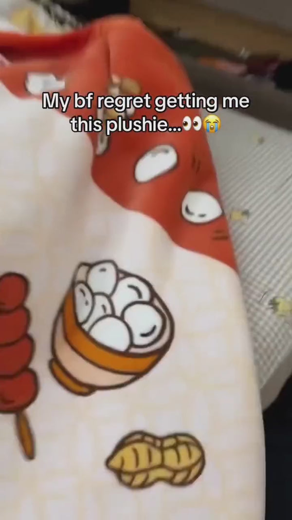 Hugging Eddie the Eggplant plush
