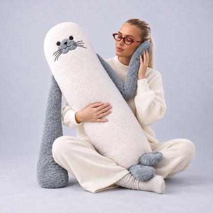 Woman sitting and hugging Sully the Seal